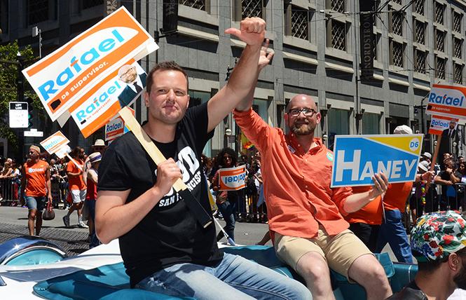 Incoming District 6 Supervisor Matt Haney, left, and gay District 8 Supervisor Rafael Mandelman, shown in last year's Pride parade, can work together on projects benefiting the LGBT community this year. Photo: Rick Gerharter