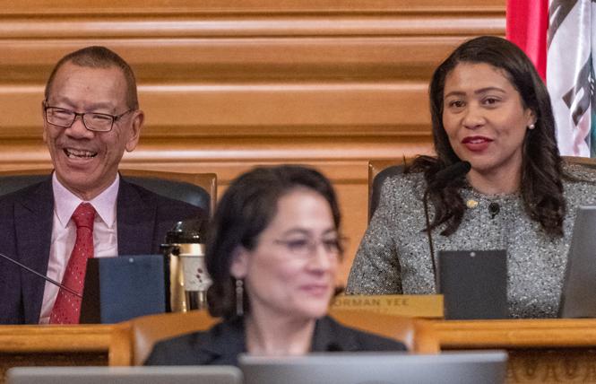 New San Francisco Board of Supervisors President Norman Yee, left, received congratulations from Mayor London Breed Tuesday. Photo: Jane Philomen Cleland