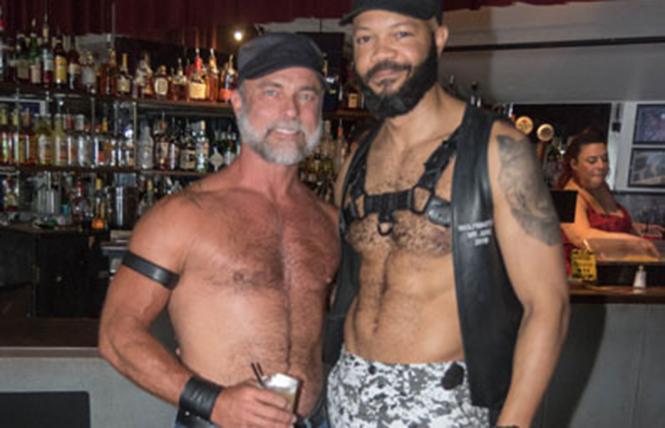 Sexy men like these at the SF Eagle meet and mingle in the flesh, but often the actual erotic connections happen separately online. Photo: Rich Stadtmiller