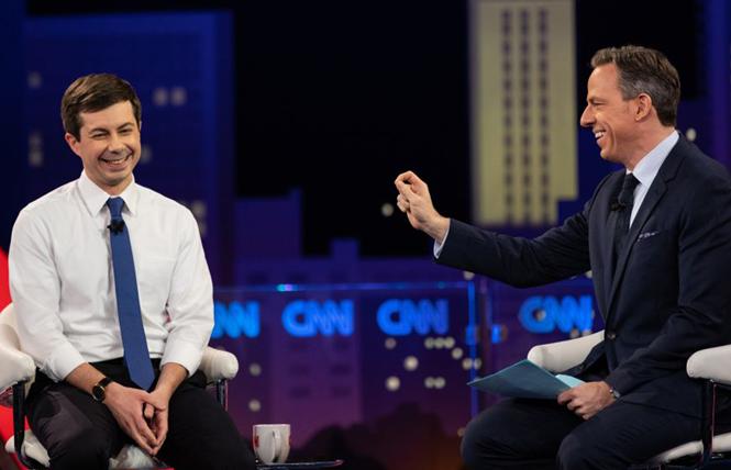 Democratic presidential candidate Pete Buttigieg, left, takes questions from moderator Jake Tapper at a CNN town hall in Austin, Texas. Photo: Courtesy CNN