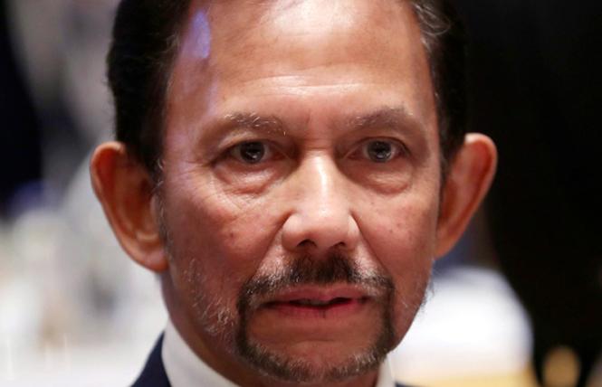 Brunei's Sultan Hassanal Bolkiah has indicated the country will fully implement Islamic criminal codes based on sharia law this week. Photo: Courtesy AP Photo/Francisco Seco