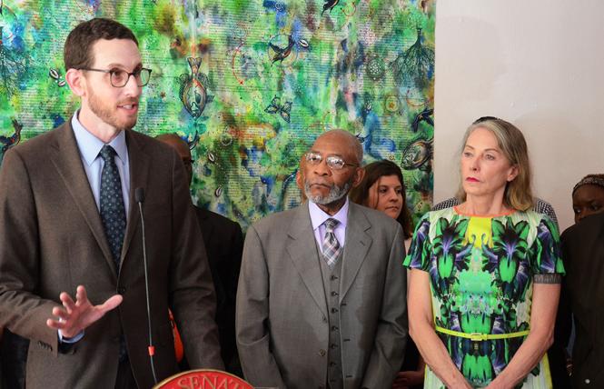 State Senator Scott Wiener lambasts the AIDS Healthcare Foundation's advertising against his Senate Bill 50, which would allow greater density along major transit routes. Community supporters of the measure, including the Reverend Amos Brown, center, and District 5 Supervisor Vallie Brown, also appeared at the event. Photo: Rick Gerharter