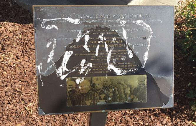 The plaque at Pink Triangle Park and Memorial was discovered vandalized Wednesday morning. Photo: Gerald Abbott