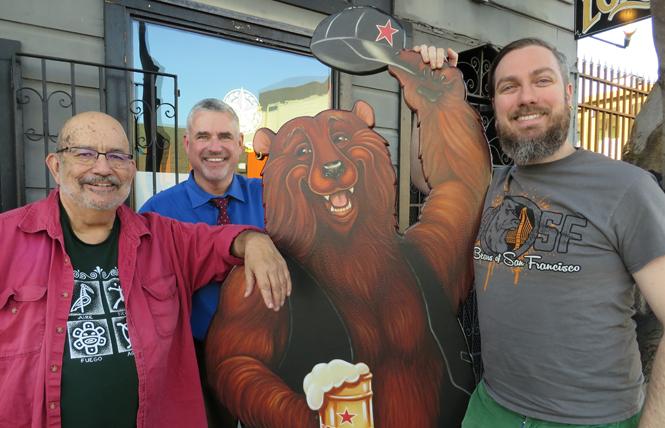 Bears of San Francisco steering committee members Larry Rivera, left, Jack Sugrue, and Erik Green stand in front of the Lone Star Saloon. Photo: Charlie Wagner