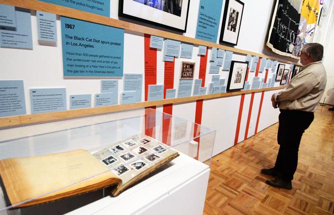 A timeline showing significant events in queer history is part of the Oakland Museum of California's exhibit "Queer California: Untold Stories." Photo: Rick Gerharter