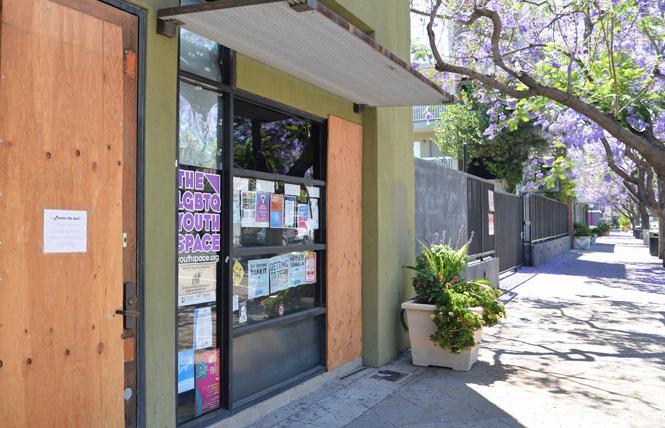 Boards cover the broken windows and door of San Jose's LGBTQ Youth Space, which was vandalized early in the morning June 10. Photo: Jo-Lynn Otto