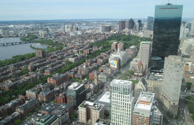 The Boston skyline glistens as seen from the Prudential Skywalk Observatory. Photo: Ed Walsh