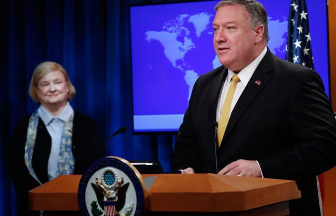 Secretary of State Mike Pompeo, right, unveils the creation of the Commission on Unalienable Rights, headed by Mary Ann Glendon, left, during an announcement at the U.S. State Department in Washington. Photo: Pablo Martinez Monsivais/AP
