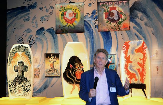 Ed Hardy speaks about his designs printed on boogie boards, on display as part of the exhibit "Ed Hardy: Deeper than Skin" now at the de Young Museum. Photo: Rick Gerharter