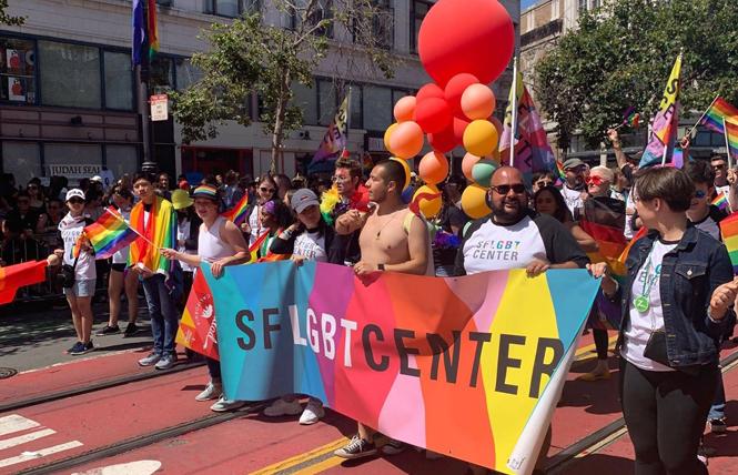 The San Francisco LGBT Community Center, shown here in June's Pride parade, has received nearly $61,000 from Plus Products for the sale of its cannabis-infused gummies. Photo: Courtesy SF LGBT center via Facebook