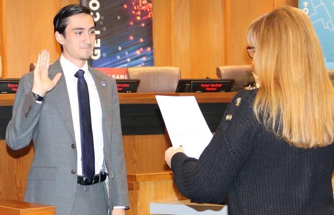 Glenna Wurm-Hayenga administered the oath of office to San Leandro Unified School District Trustee James Aguilar. She was his American Sign Language and leadership teacher at San Lorenzo High School. Photo: Courtesy James Aguilar