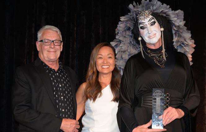 San Francisco AIDS Foundation board chair Mary Cha-Caswell, center, is flanked by Cleve Jones, who helped found the AIDS service organization, and honoree Sister Roma at SFAF's Tribute Celebration held September 7, just before the release of its new strategic plan. Photo: Bill Wilson