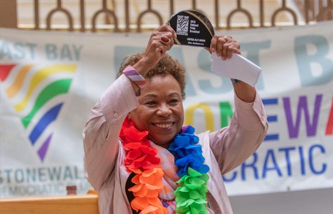 Congresswoman Barbara Lee holds the LGBTQIA Ally Award she received at the East Bay Stonewall Democratic Club's Pride breakfast Sunday in Oakland. Photo: Jane Philomen Cleland