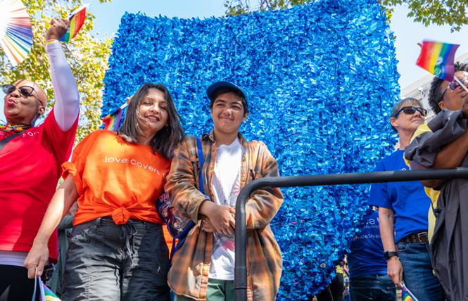 Angelica Matsuno, left, and her son, Rei, rode on the Blue Shield Pride float in the September 8 Oakland Pride parade. Photo: Jane Philomen Cleland
