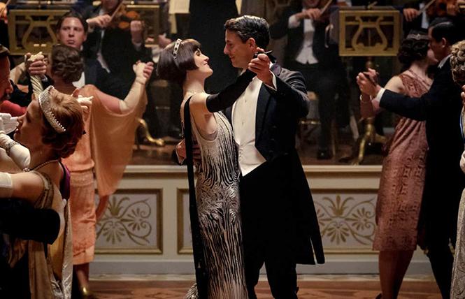 Michelle Dockery as Lady Mary Talbot (center left) and Matthew Goode as Henry Talbot in a scene from the film. Photo: AP