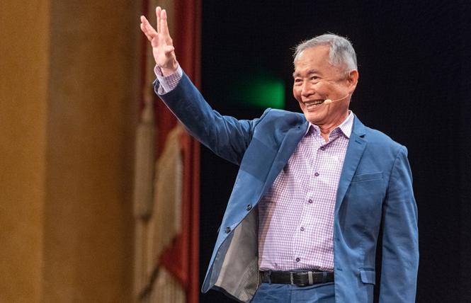 George Takei gives the Vulcan salute Tuesday during an appearance at the Commonwealth Club. Photo: Jane Philomen Cleland