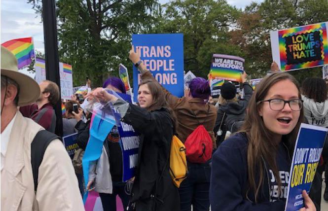 Supporters of LGBT rights gathered outside the U.S. Supreme Court Tuesday during historic oral arguments. Photo: Lisa Keen