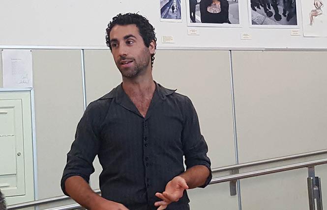 Assaf Pashut, owner of the Flying Falafel, spoke to the Castro Merchants group last month. Photo: Cynthia Laird  