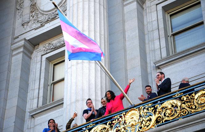 Mayor London Breed kicks off Transgender Awareness Month during a ceremony at City Hall November 1 where she raised the trans flag. Photo: Rick Gerharter