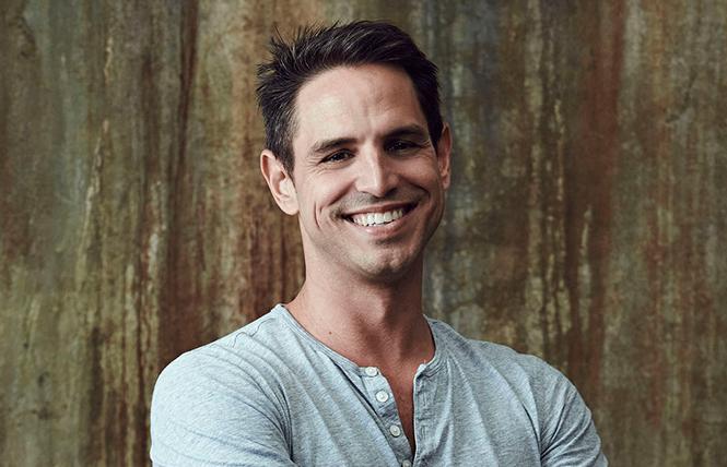 Arrowverse producer Greg Berlanti: his shows have all the queers, the first lesbian Batwoman and the first trans superhero. Photo: Courtesy of Warner Bros.