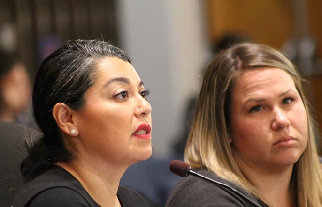 Maribel Martínez, left, and Alicia Anderson proposed increasing LGBT services in the South Bay during remarks to the Santa Clara County Board of Supervisors December 10. Photo: Heather Cassell