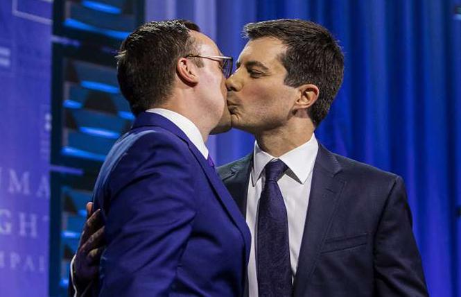 Pete Buttigieg kissing his husband Chasten was groundbreaking gay TV. Photo: AP