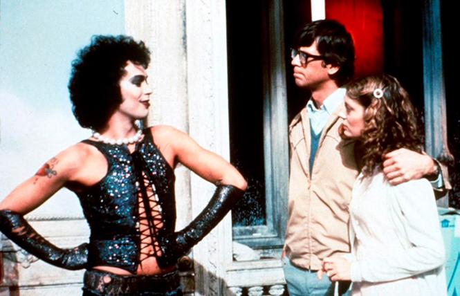 Tim Curry as Dr. Frank N. Furter, Barry Bostwick as Brad Majors, and Susan Sarandon as Janet Weiss in "The Rocky Horror Picture Show." Photo: 20th Century Fox