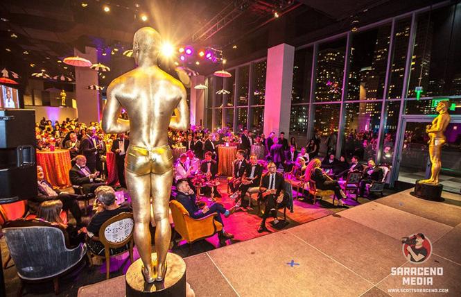 Gold "Oscar guys" have been a staple at Academy of Friends Oscar galas, where last year a couple of them overlooked the crowd. Photo: Scott Saraceno