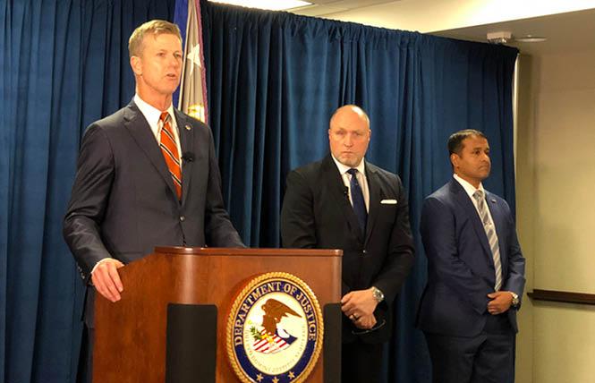 U.S. Attorney David Anderson, left, is joined by FBI Special Agent In Charge John Bennett, and Assistant Special Agent In Charge Sid Patel at the Phillip Burton Federal Building in downtown San Francisco January 28 in announcing a federal corruption charge against Public Works Director Mohammed Nuru and restaurant owner Nick James Bovis. Photo: John Ferrannini