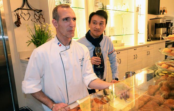 Maison Danel co-owners and husbands Danel de Betelu, left, and David de Betelu stand behind the pastry counter during a February 11 media preview. Photo: Rick Gerharter