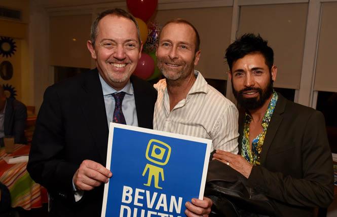 BART board member Bevan Dufty, left, who's running for reelection on the progressive DCCC slate in Assembly District 17, was joined by friends Scott Hobbs, center, and his husband, Alex Serrano, at a recent birthday party fundraiser for Dufty's race. Photo: Steven Underhill