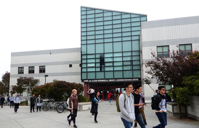 Students pass the Rosenberg Library on the main campus of City College of San Francisco. Photo: Rick Gerharter