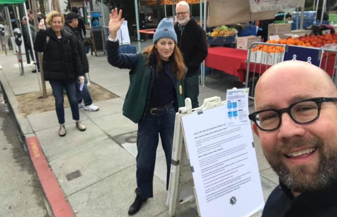 Practicing social distancing, District 8 Supervisor Rafael Mandelman, right, attended the Noe Valley Farmers Market last weekend with Leslie Crawford, center, who helped found the weekly market, and Jessica Closson, the District 8 safety coordinator. Photo: Courtesy Facebook