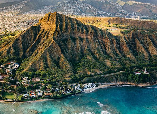 Hawaii is a popular destination, but is currently asking visitors to stay away because of the coronavirus outbreak. Photo: Diamond Head, Hawaii Tourism Authority (HTA) / Vincent Lim