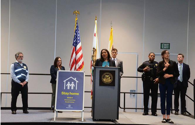 San Francisco Mayor London Breed, shown at the city's emergency operations center earlier this month, announced Monday that the shelter-in-place order would be extended through May 3. Photo: Rick Gerharter
