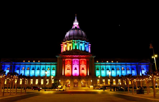 San Francisco City Hall was lit in rainbow colors Friday, April 10, to honor the life of lesbian pioneer Phyllis Lyon, who died April 9. Photo: Steven Underhill