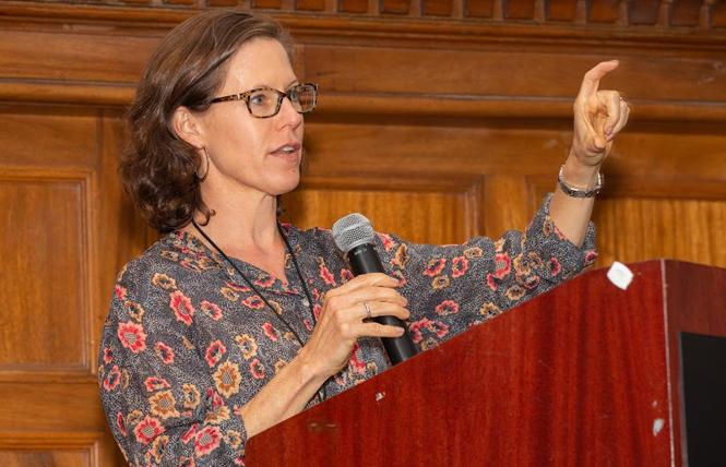 Dr. Annie Leutkemeyer, shown speaking at an End Hep C event in San Francisco last fall, cautioned against reading too much into early studies of remdesivir. Photo: Eric Slomanson/Courtesy End Hep C SF