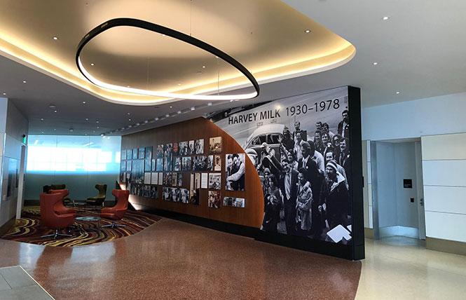 An overview of the Central Inglenook in Harvey Milk Terminal 1 at San Francisco International Airport features photos of Milk's life, and a sitting area that is frequently cleaned. Photo: Courtesy SFO