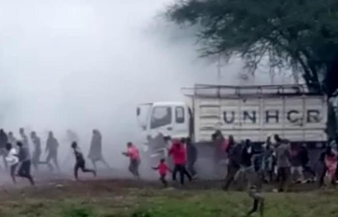 Kenyan police officers sprayed LGBT protesters with tear gas as they ran away at the United Nations High Commissioner for Refugees office in Kakuma, where the world's largest refugee camp is located. Photo: Courtesy Facebook/Sebuuma Stephen