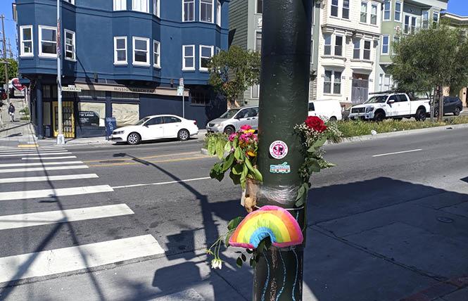 A memorial was set up at 14th and Guerrero streets honoring bi transit advocate Courtney Brousseau, who died after he was shot at the intersection May 1. Photo: Scott Wazlowski 