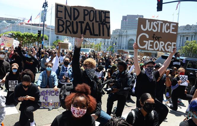 Participants at a kneel-in outside San Francisco City Hall Monday, June 1, heard from actor Jamie Foxx and Mayor London Breed as they demanded justice for the police killing of George Floyd in Minneapolis. Photo: Rick Gerharter