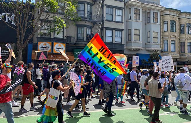 Hundreds of people took part in the People's March on Polk Street at California and Pine streets Sunday, June 28. Photo: John Ferrannini