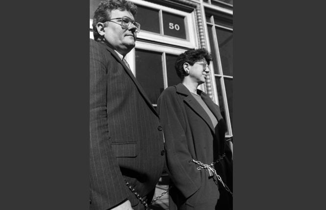 Harry Britt and Ellen R. Shaffer chained themselves to a fence outside the San Francisco Federal Building on January 19, 1989. Photo: Rick Gerharter