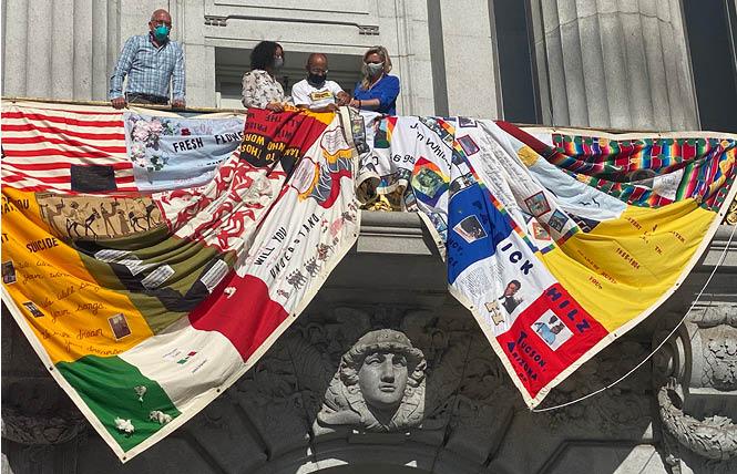 A section of the AIDS Memorial Quilt was unfurled Monday at San Francisco City Hall for the beginning of the International AIDS Conference. Photo: Liz Highleyman