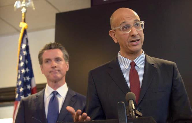 Dr. Mark Ghaly, right, shown here with Governor Gavin Newsom at an earlier press briefing, announced Tuesday that SOGI data would be collected for COVID-19. Photo: Courtesy AP