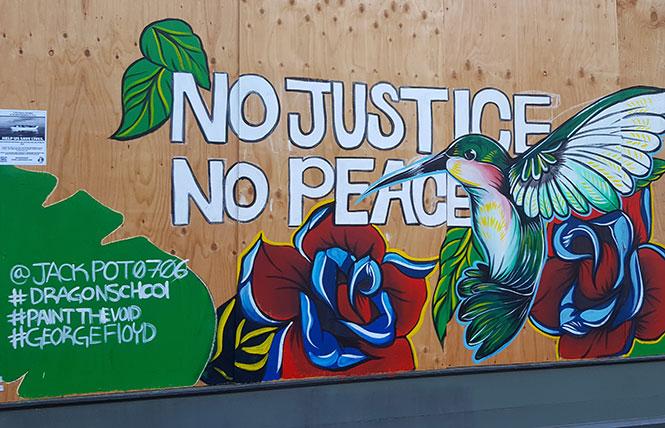 A mural was created on Broadway in Oakland after the Black Lives Matter protests earlier this summer. Photo: Cynthia Laird
