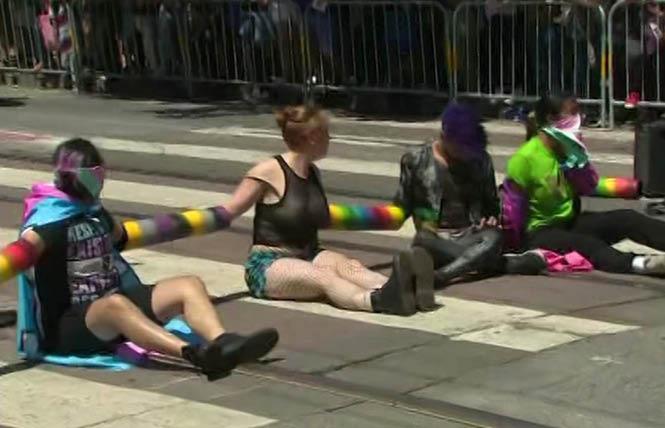 Protesters blocked the San Francisco Pride parade June 30, 2019. One of two people who were arrested, but who said they were not blocking the street, has sued the city of San Francisco in federal court. Photo: Courtesy ABC7 News