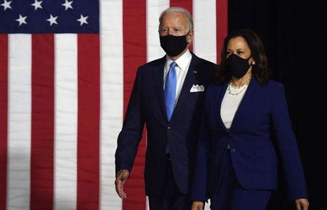 Joe Biden and Kamala Harris wore masks as they arrived to meet the press August 12. Photo: Courtesy CBS News