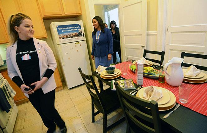 Clair Farley, left, from the Office Transgender Initiatives, and Mayor London Breed checked out the new kitchen at Our Trans Home SF during a January tour. Photo: Rick Gerharter