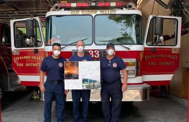 Jonathan Cook posted a photo from one of his neighbors thanking firefighters from Contra Costa County house engine 86 and San Ramon Valley house engines 33 and 34 for saving their Fairfield neighborhood last week. Photo: Courtesy Facebook